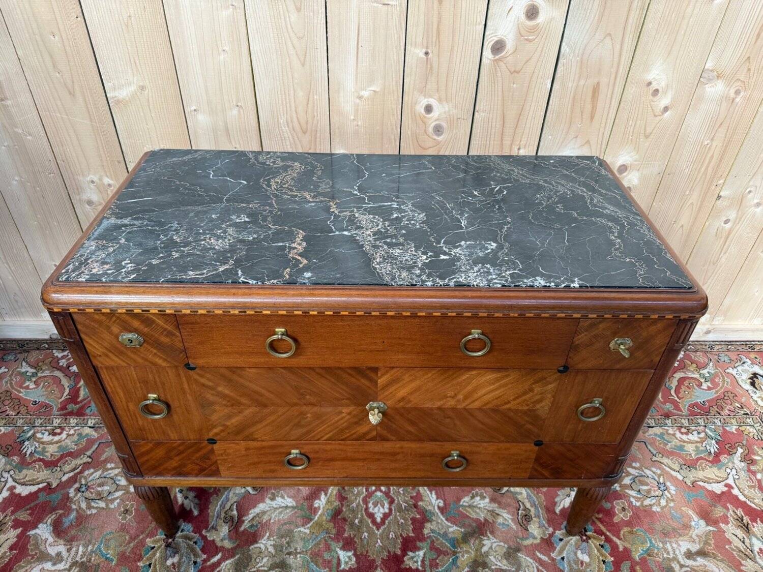 Art Deco walnut and black marble commode from the 1960s.
