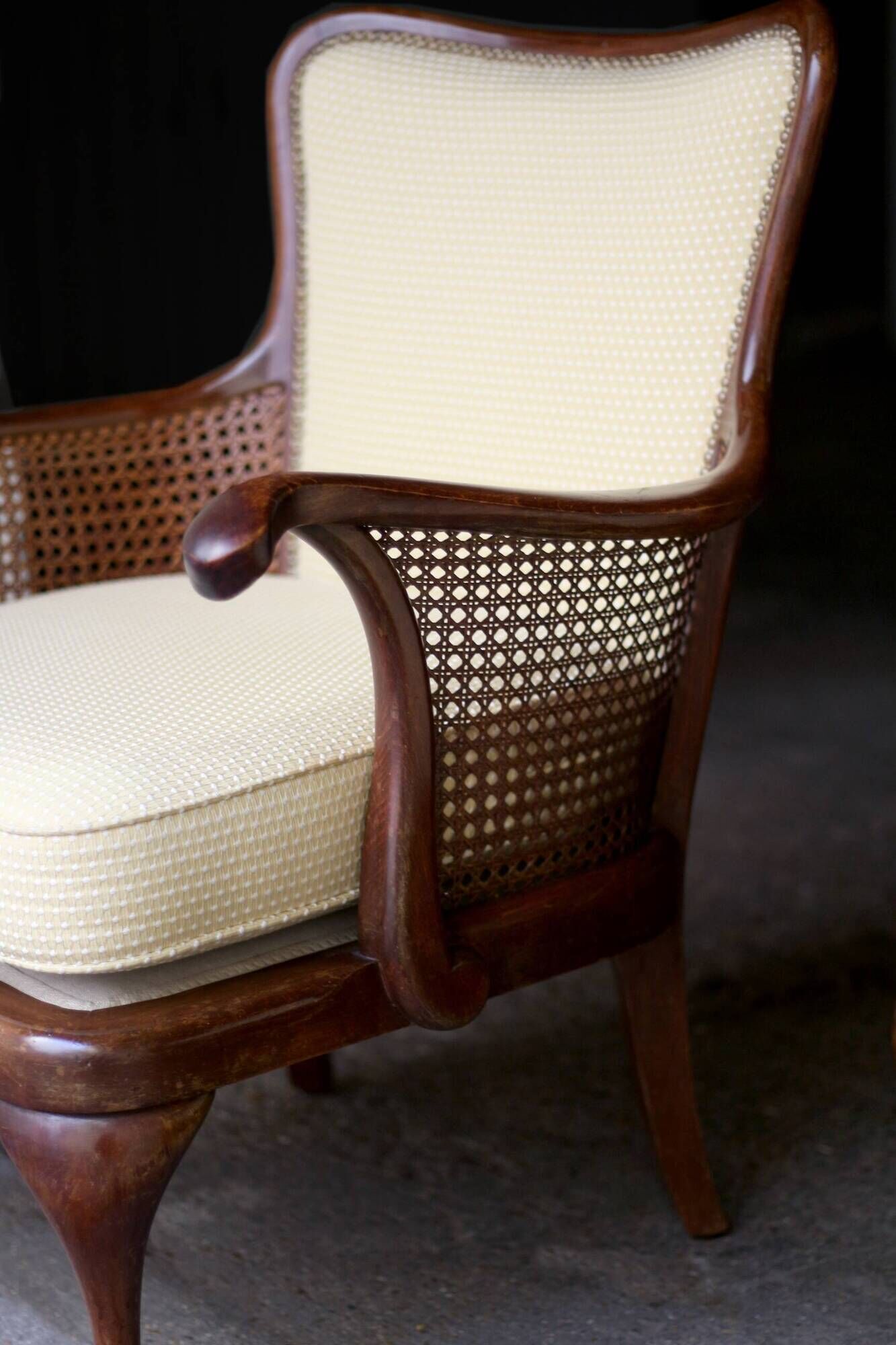 pair of mahogany and cane armchairs. English work (1960s).
