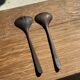 Pair of salad servers or kitchen utensils in blackened teak L30 D9