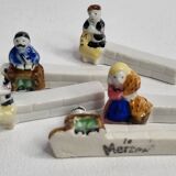 Five porcelain knife holders signed "Le Merzer", 6 cm