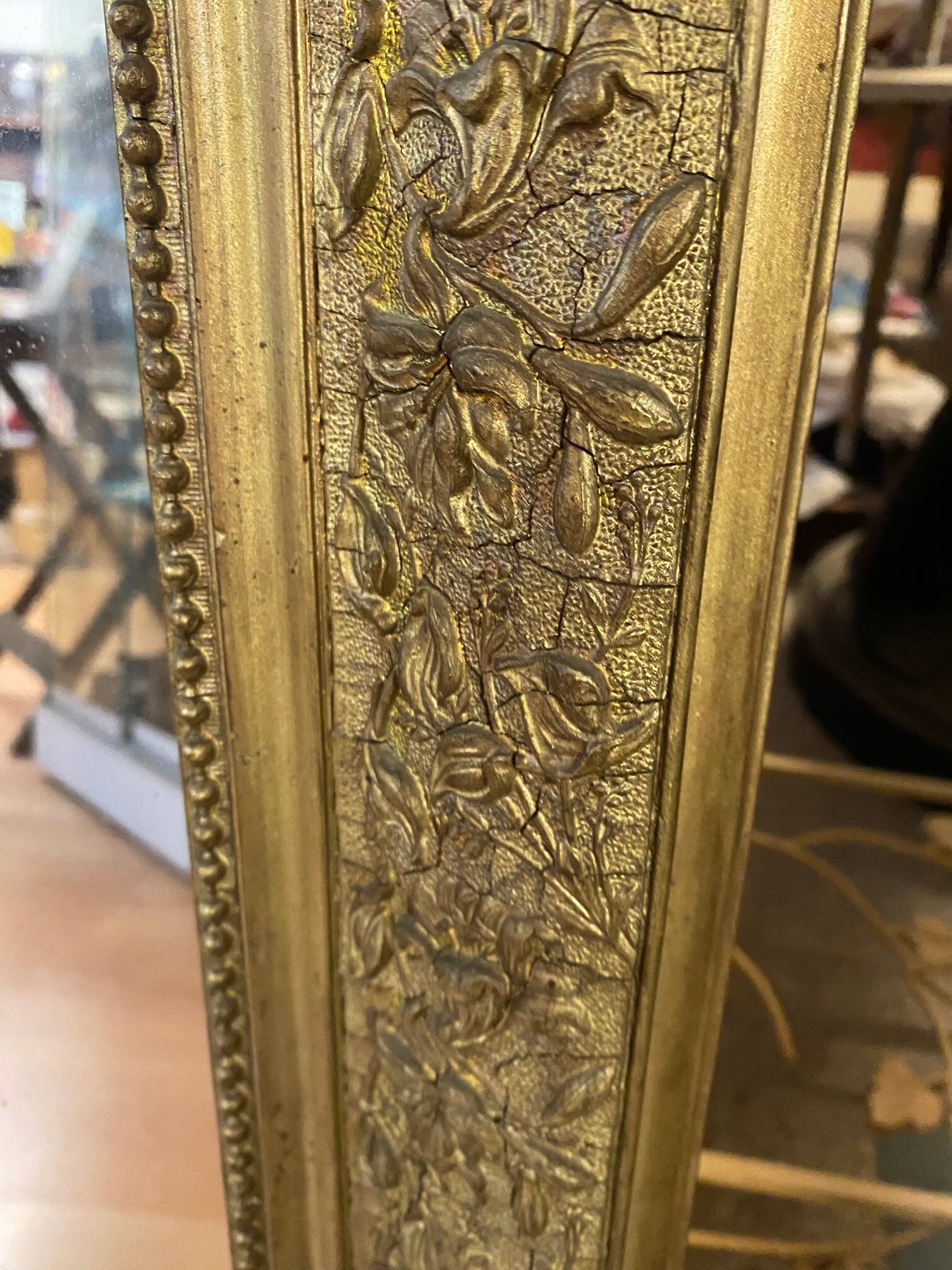 LARGE LOUIS XV STYLE ROCAILLE MIRROR IN GILT STUCCO FORAL DECOR ON PEDAL