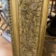 LARGE LOUIS XV STYLE ROCAILLE MIRROR IN GILT STUCCO FORAL DECOR ON PEDAL