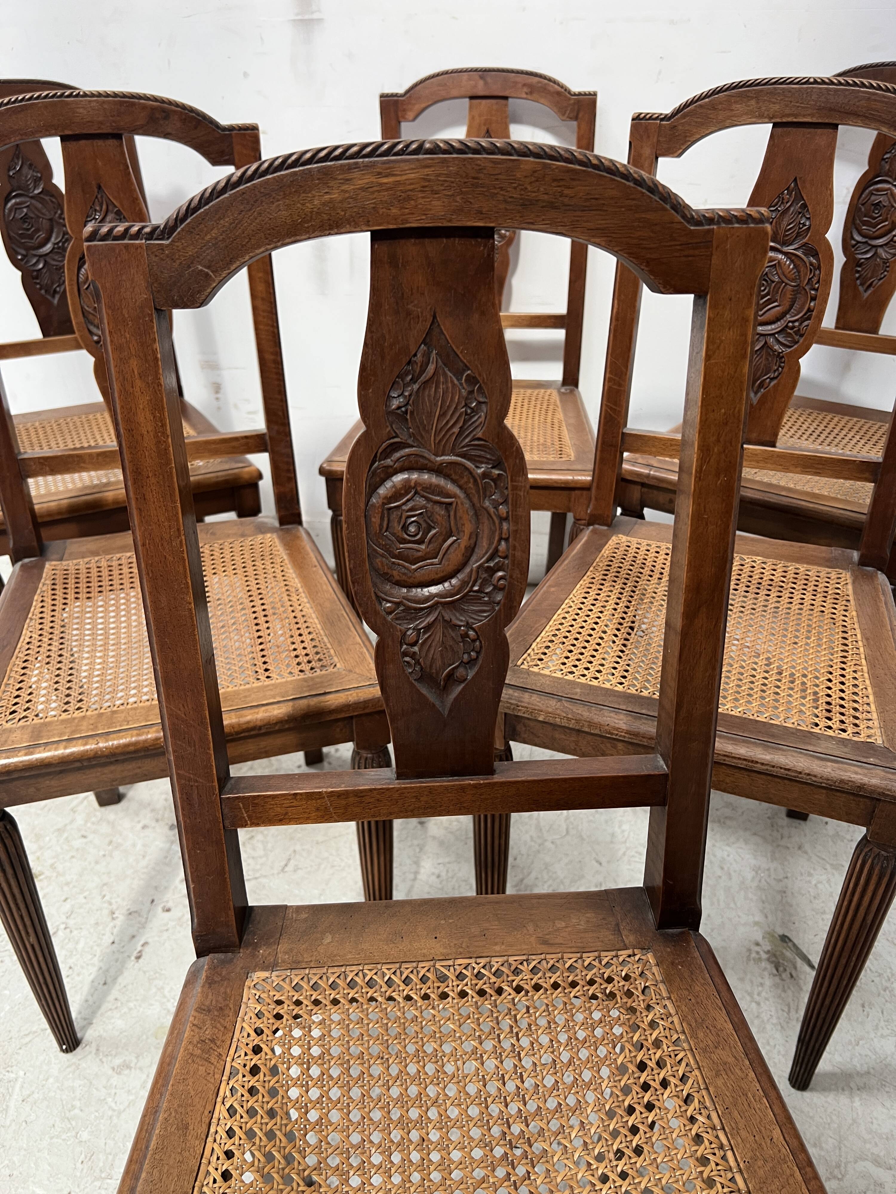 Set of six Art Deco chairs in solid walnut, 20th century.