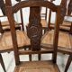 Set of six Art Deco chairs in solid walnut, 20th century.