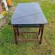 Smoked glass desk on rattan legs and leather detail
