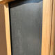 Chiffonnier 5 tiroir noir doré et bois brut
