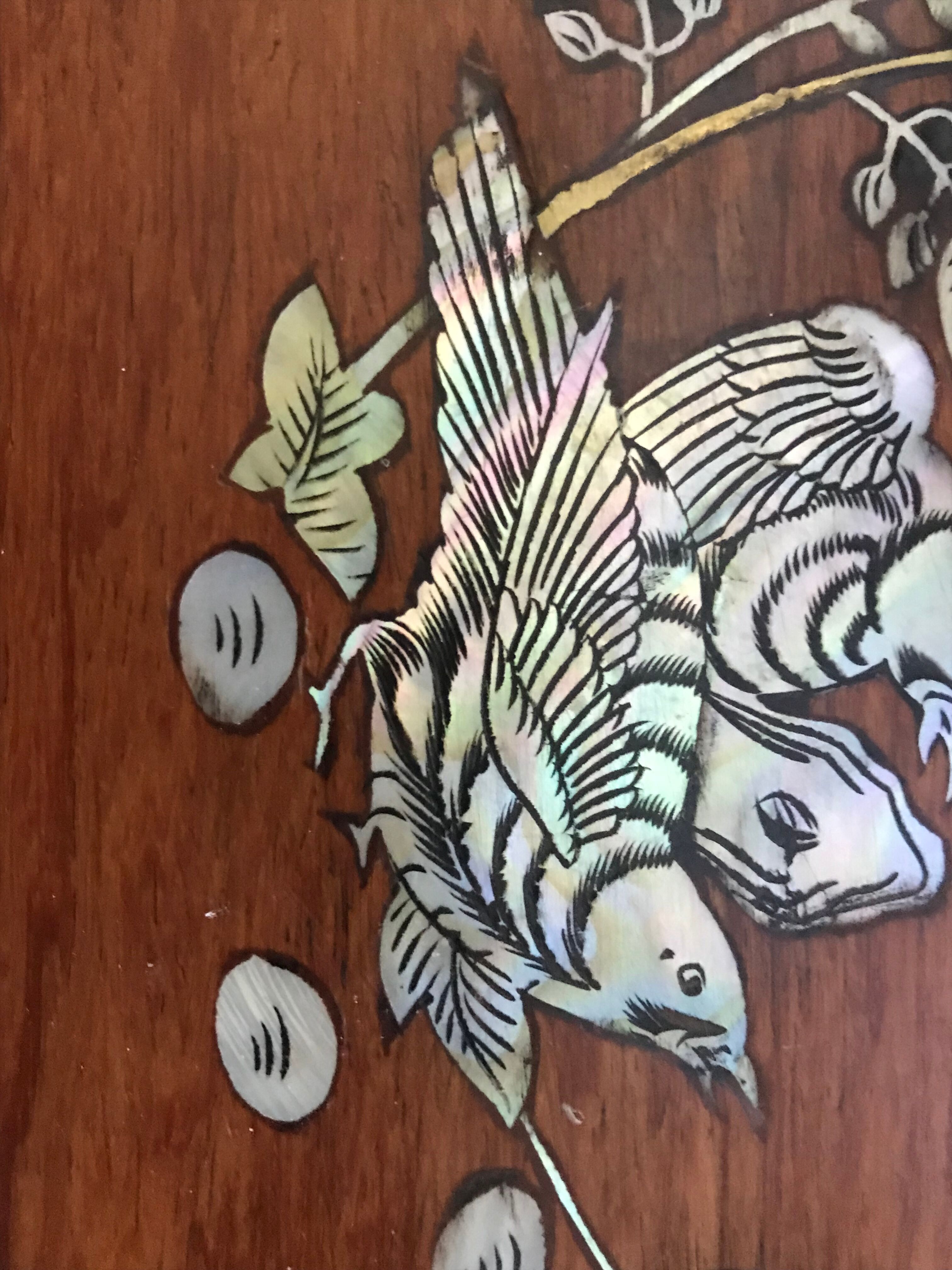 Wood and mother-of-pearl top