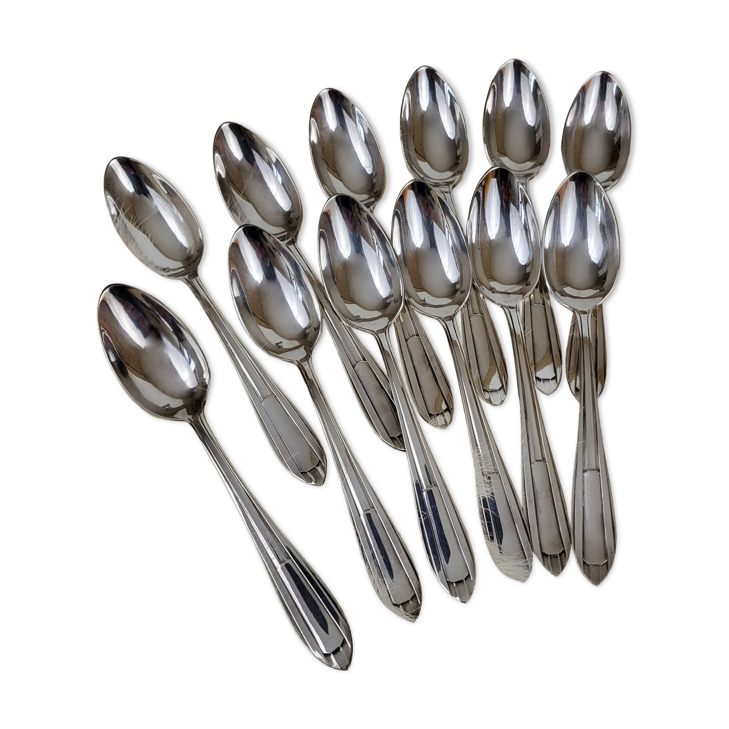 12 silver-plated metal teaspoons, Art Deco style