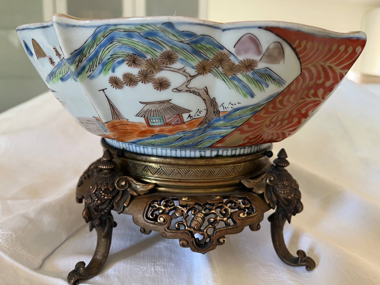 Chinese ceramic cup landscape patterns brass base supported by 4 elephants lai