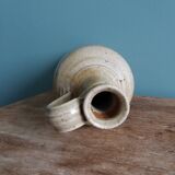 Bottle with handle, pitcher, in stoneware, signed