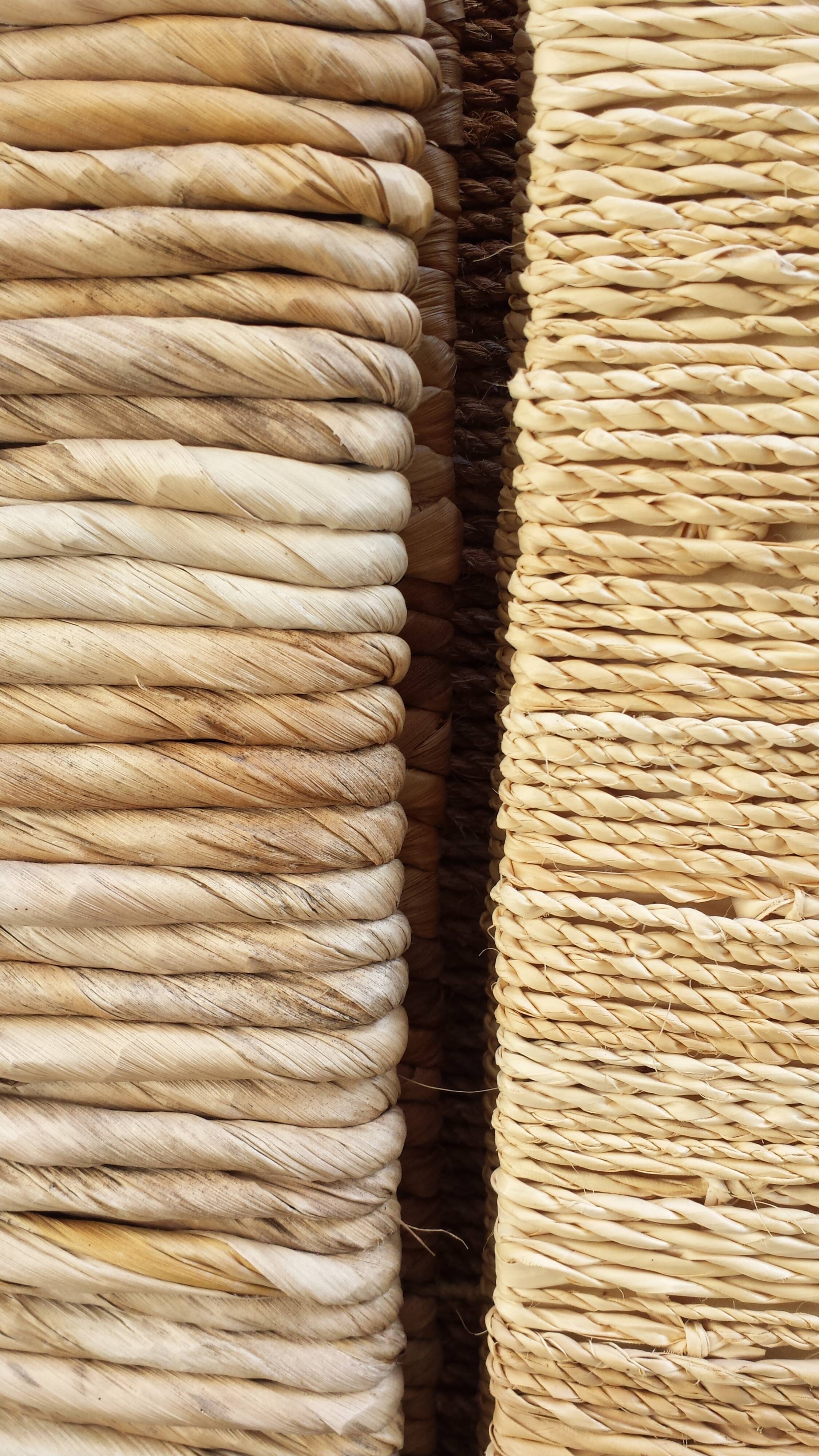 Straw and woven rope screen with metal structure