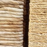 Straw and woven rope screen with metal structure