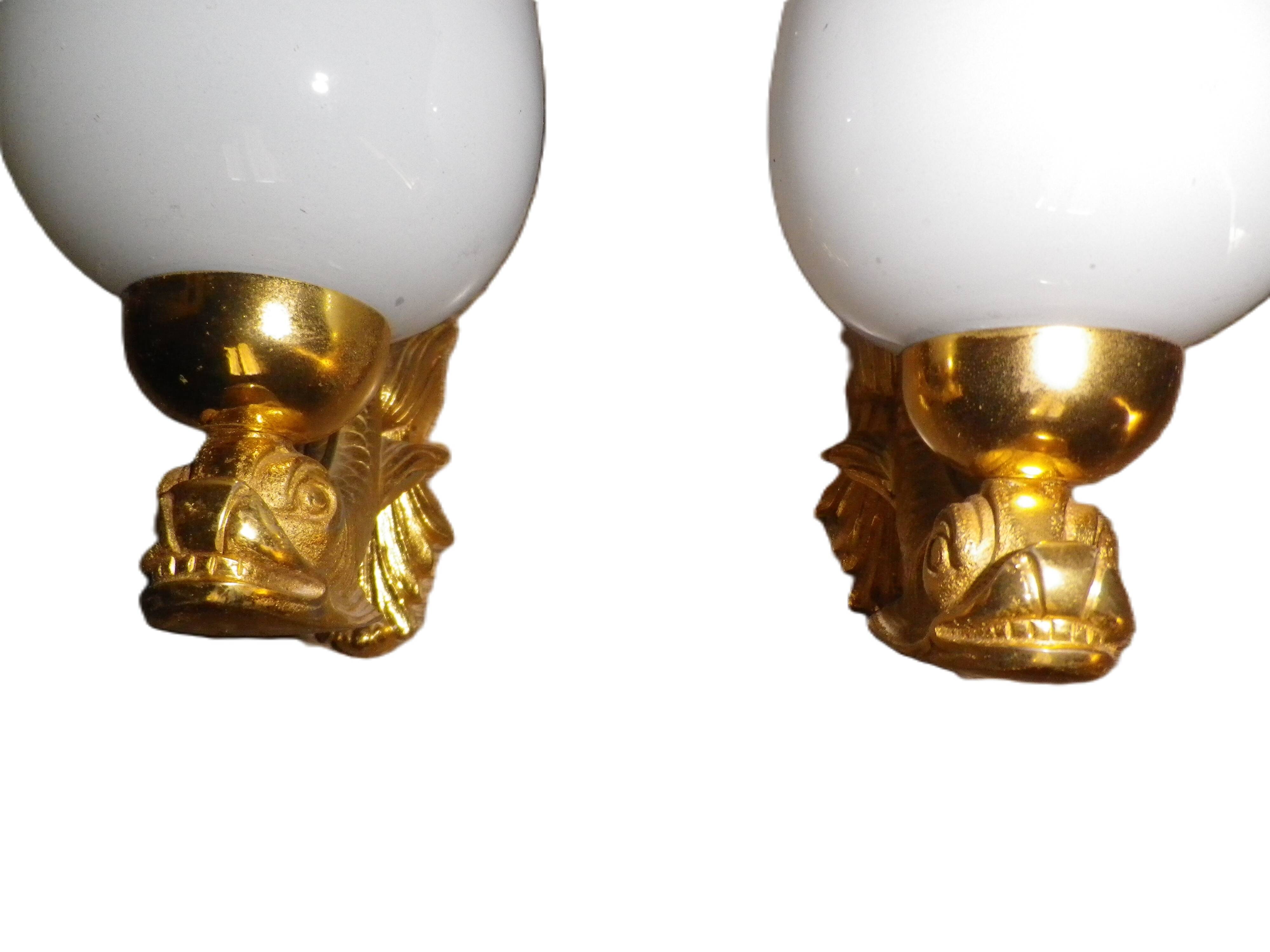 chandelier and its golden bronze brass wall lights