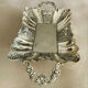 St Louis XV style letter tray, empty pocket, 20th century, in repoussé metal.