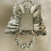 St Louis XV style letter tray, empty pocket, 20th century, in repoussé metal.