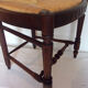 Lyre-shaped Chair bedded in natural wood with folder