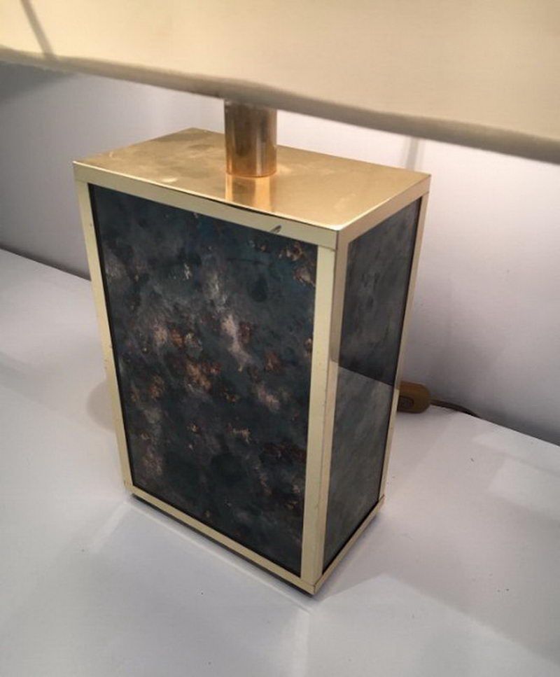 Lamp in gilded metal and stylized glass. In the style of Aldo Tura