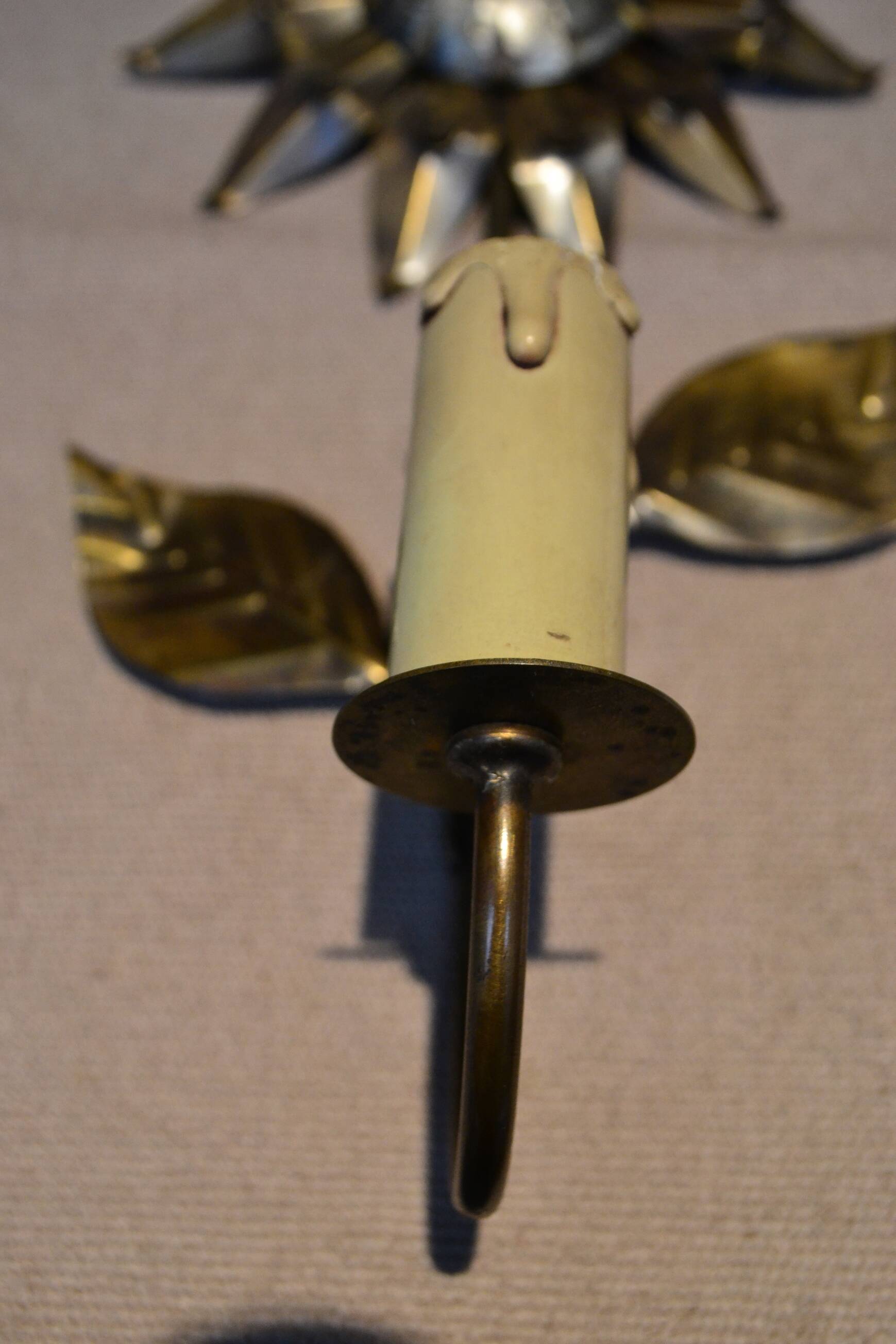 Brass flower wall light from the 1970s.