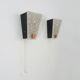 Pair of minimalist vintage appliques in granite perspex and metal structure. Year 50