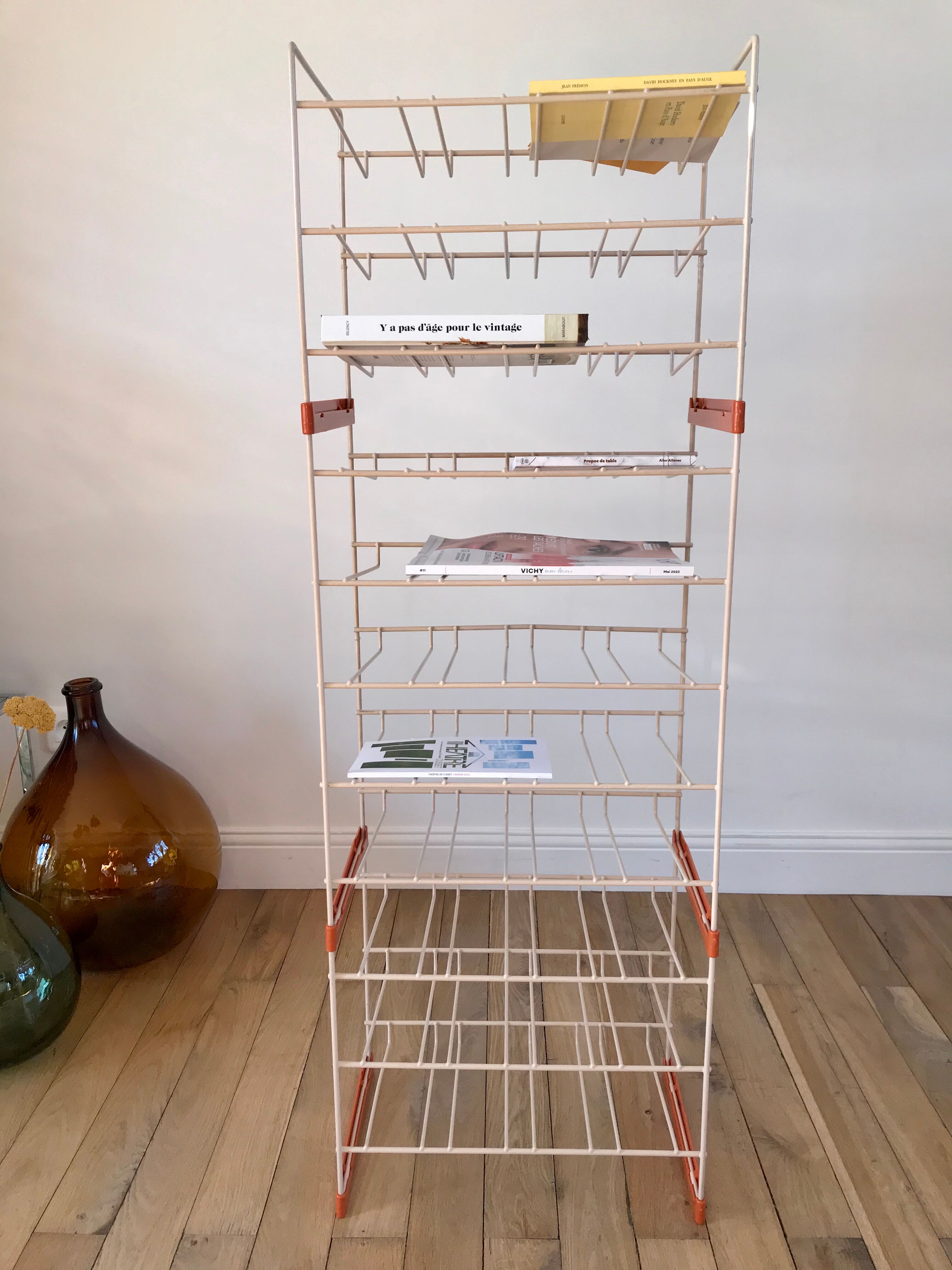 White and orange industrial shelf brand "caddie" 50s
