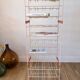 White and orange industrial shelf brand "caddie" 50s