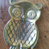empty brass owl pocket
