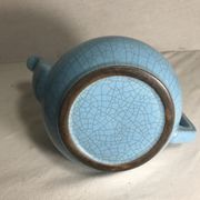 Cracked blue ceramic vintage teapot