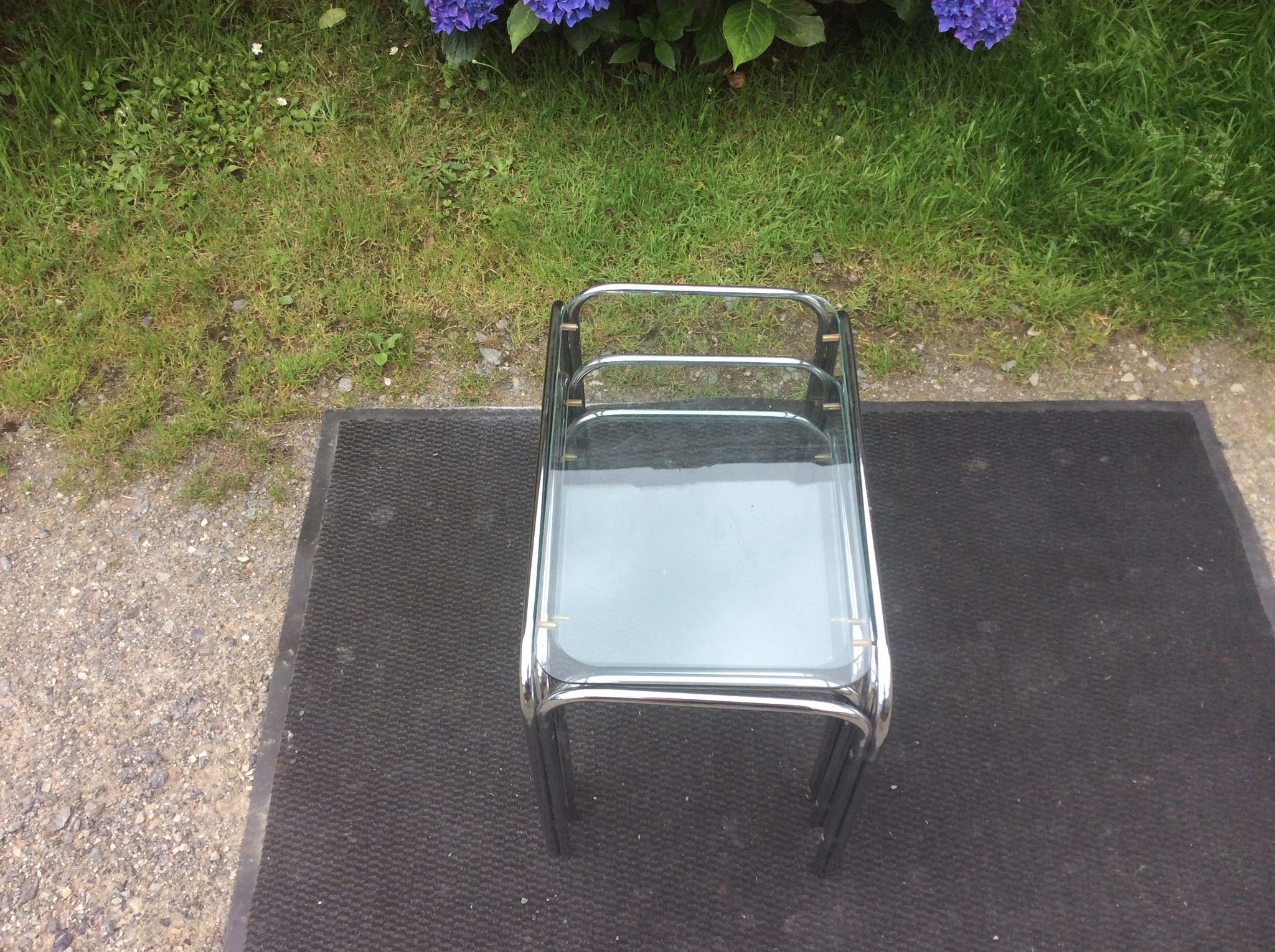 Vintage trundle tables in chrome tubular steel and glass