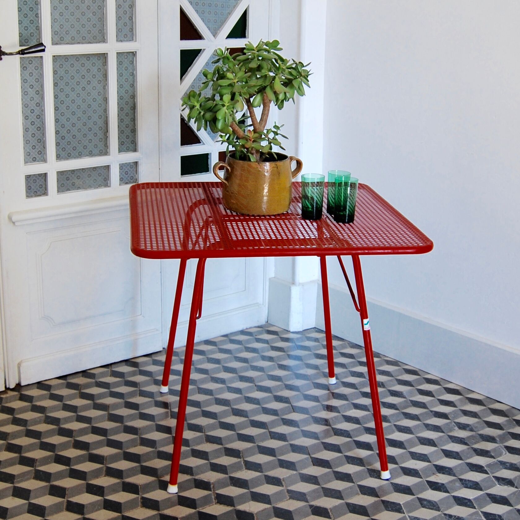 Red metal folding table Malaval type