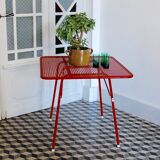 Red metal folding table Malaval type