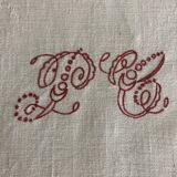 Ancient damask tablecloth with monogram