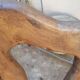 3 brutalist wooden tripod chairs
