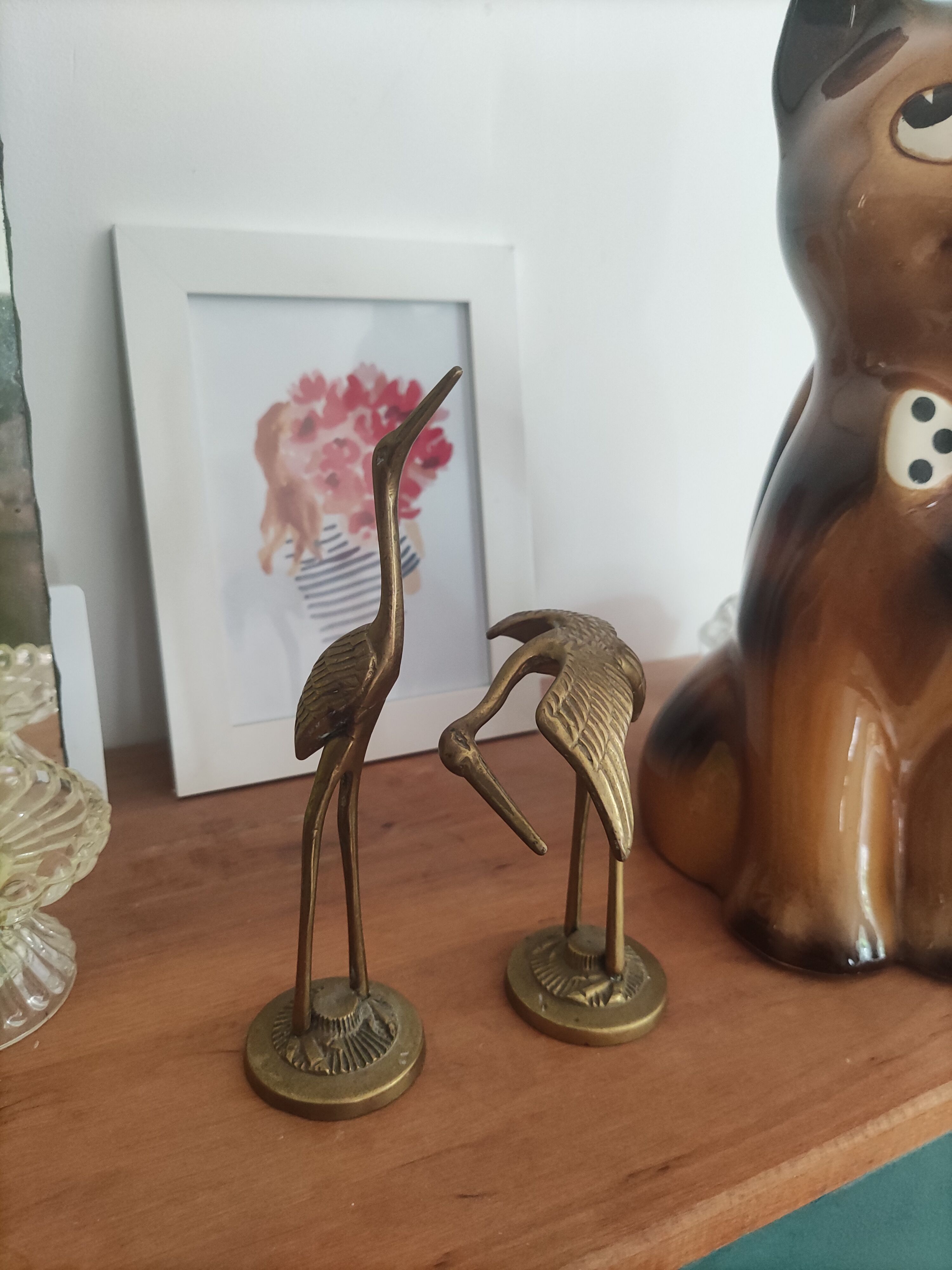 Brass heron duo