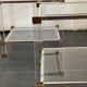 Pair of vintage and brass glass hollywood regency side tables by peter vandel