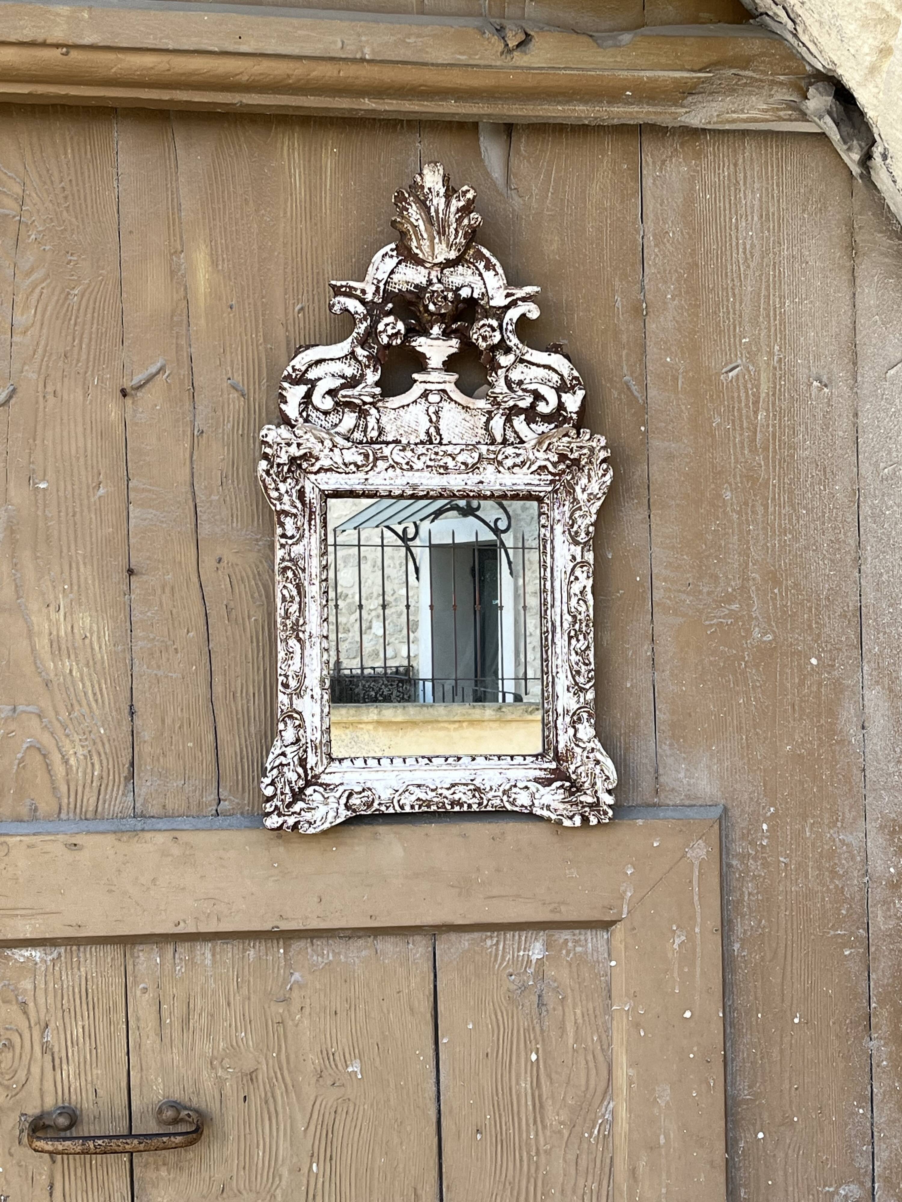 Carved wooden mirror
