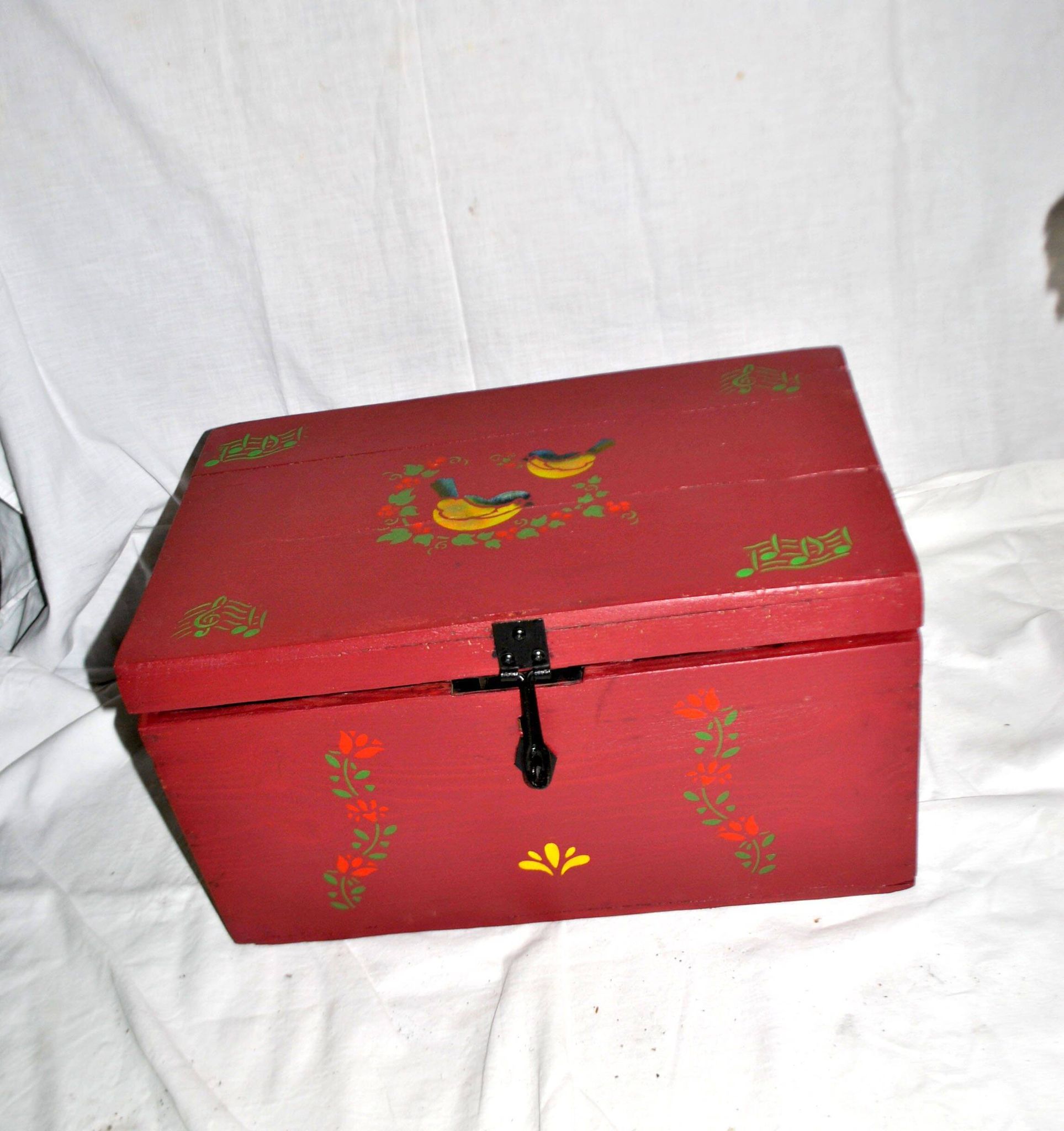 Vintage wooden trunk – toy chest or music box with painted stencil bird decoration.