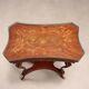 Small antique coffee table made of fruitwood and rosewood, 20th century.