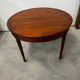Round cherry wood table in Louis XVI style