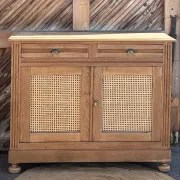 Old buffet in raw solid oak and cane.