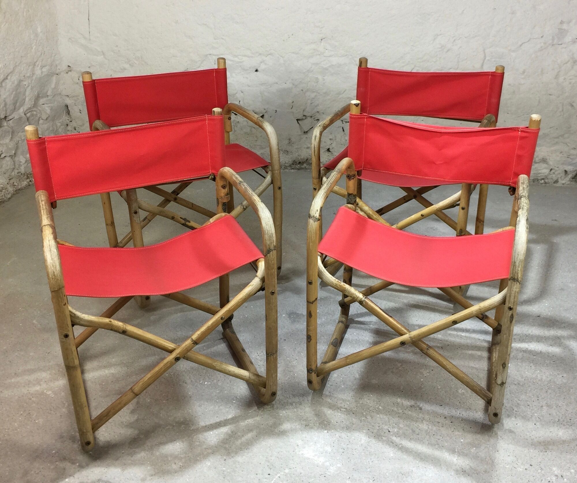 Lot of 4 chairs in rattan and red fabric, folding, 1960s