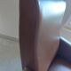 a pair of comfortable vintage armchairs with splayed legs