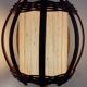Turned wood lamp.