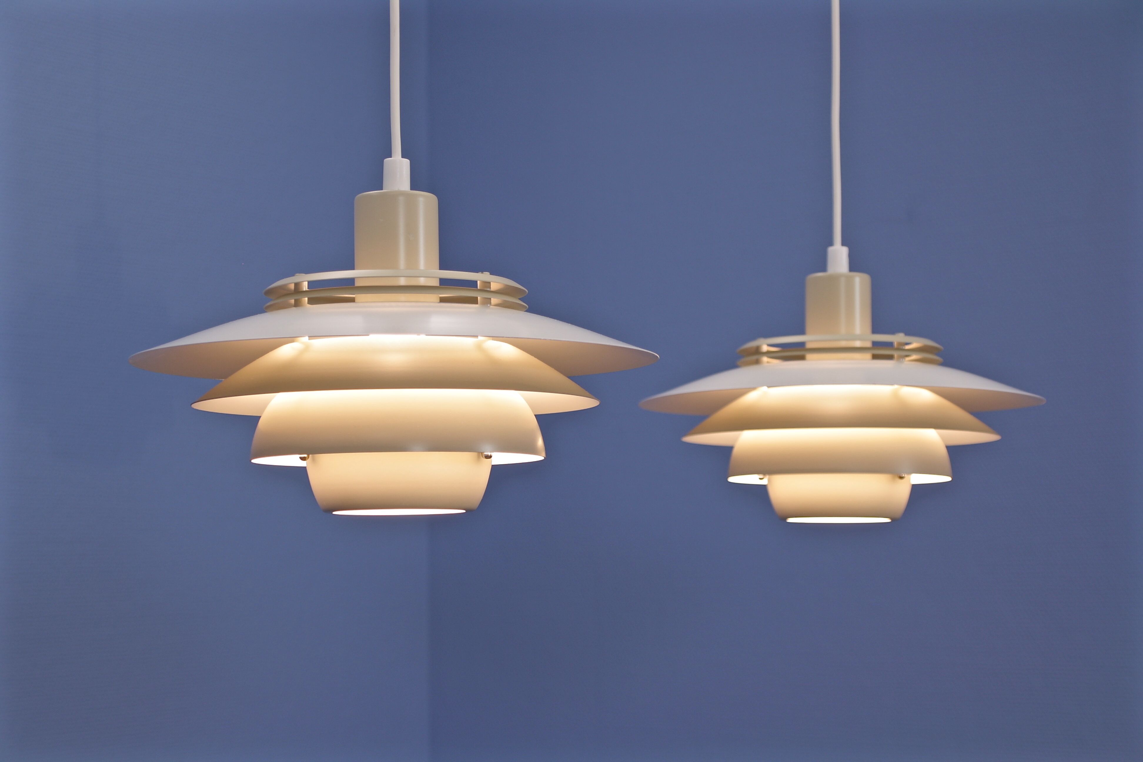 Set of 2 Danish multi coloured pendants in white and beige by Jeka, 1970s