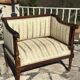 Low armchair in finely carved wood in the Louis XVI style from the 19th century
