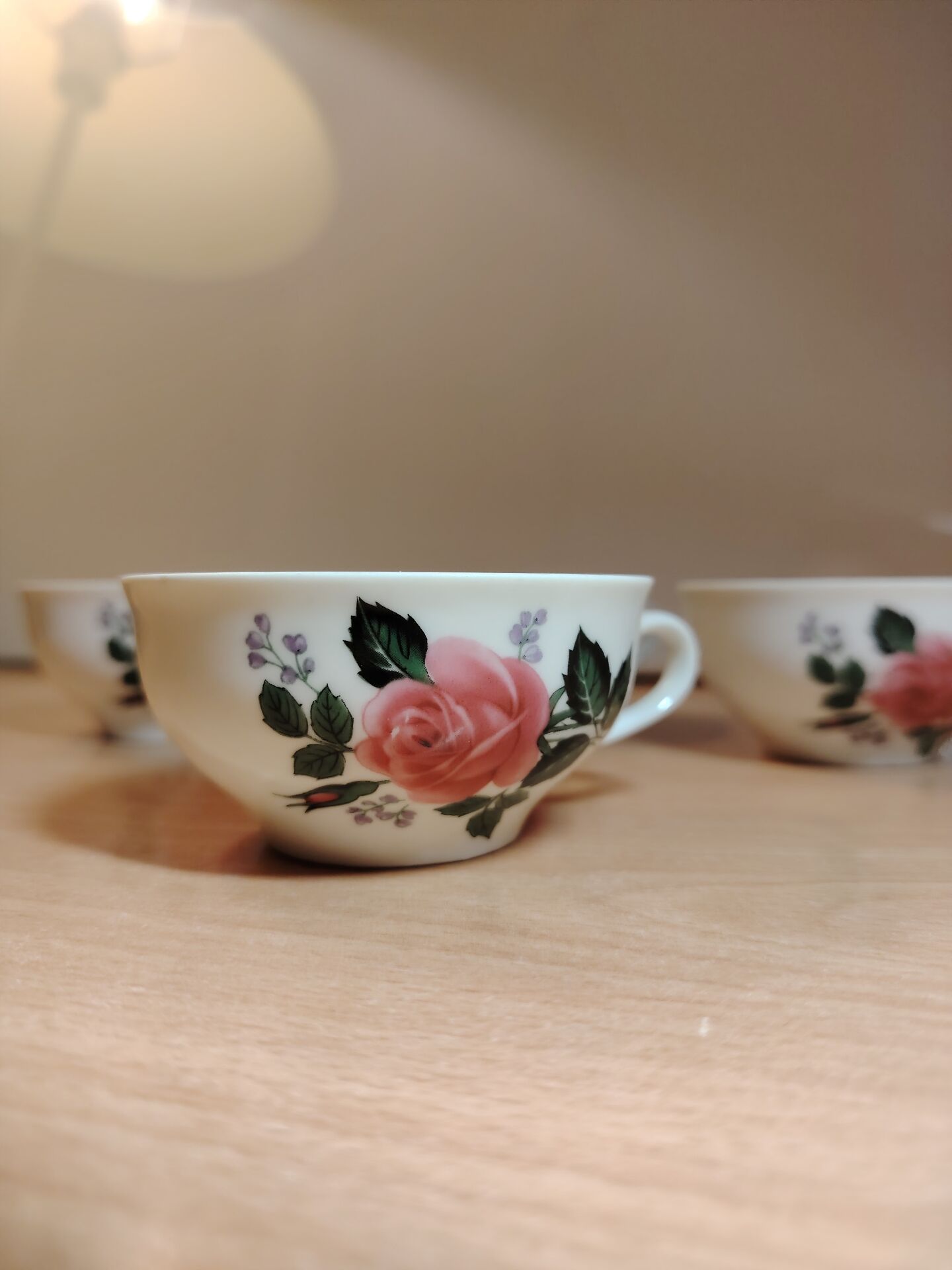 Set of 4 antique porcelain cups with rose pattern CNP France