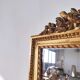 Miroir de cheminée en bois doré à décor de nœud et de roses H : 164 cm