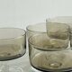 5 smoked glass dessert bowls.