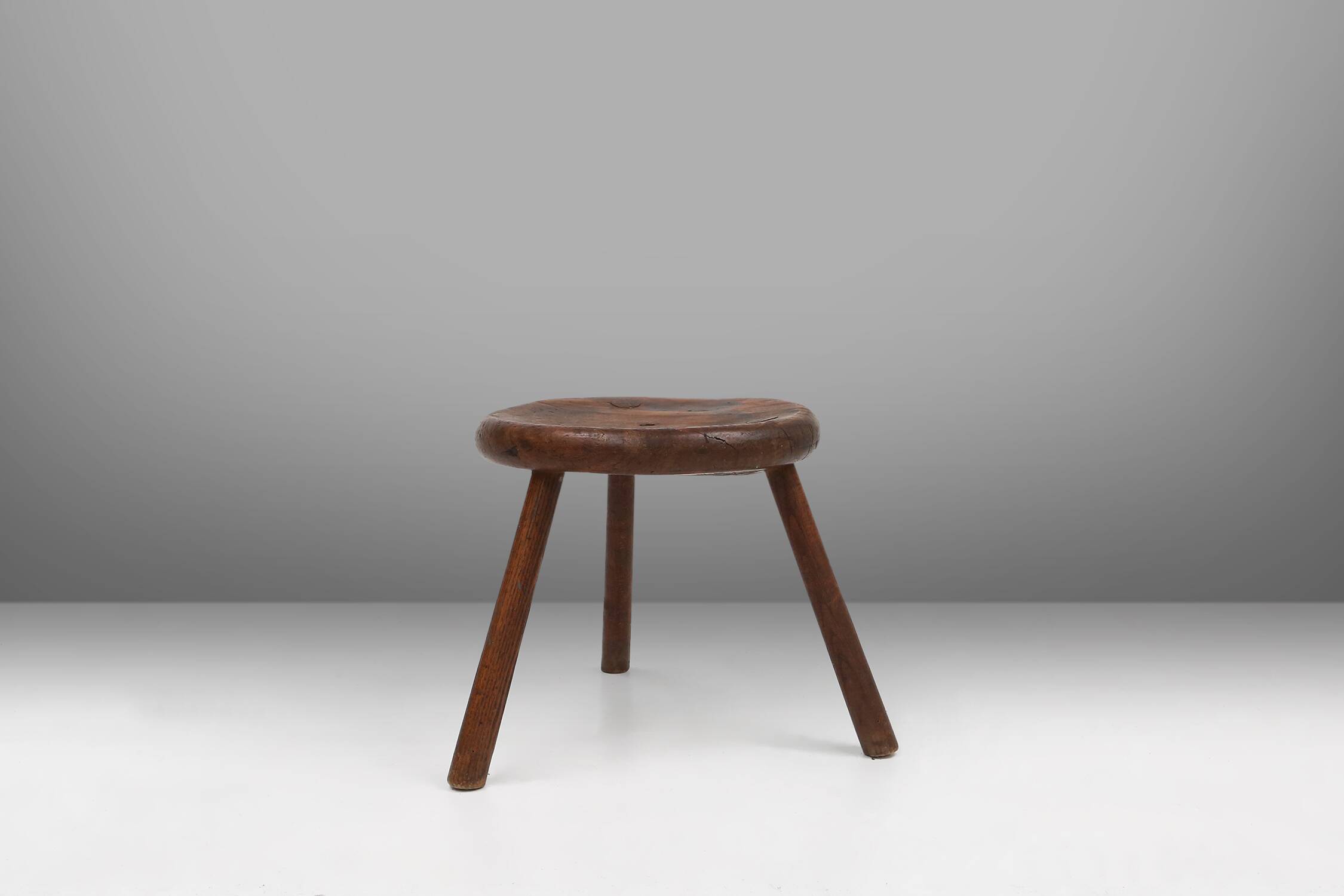 Hand-carved solid wood tripod stool with beautiful patina, France ca. 1900