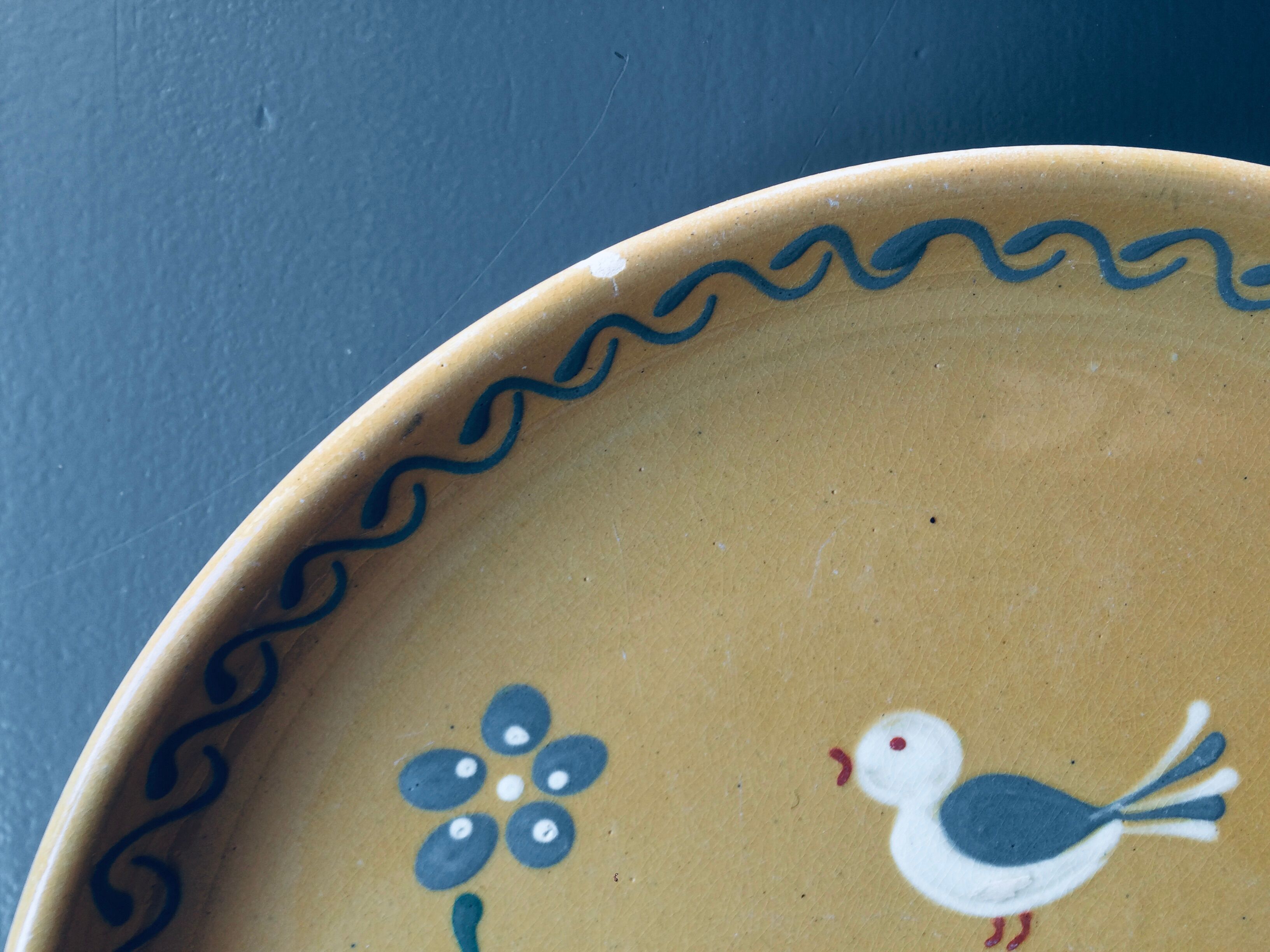 The six Piaf plates in painted terracotta