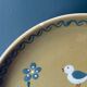 The six Piaf plates in painted terracotta